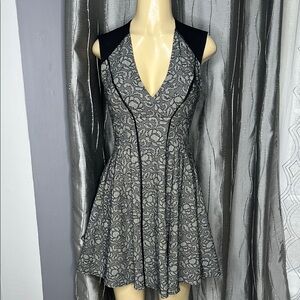 Bebe Women’s Dress Sz 2  Black and Gray  Floral Print .